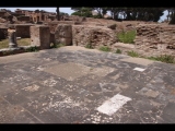 02614 ostia - regio ii - insula ix - aula del gruppo di marte e venere (ii,ix,3) - decumanus maximus - erhoehter raum - gesehen von suedosten - 06-2024.jpg